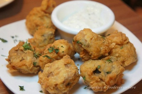 Fried mushroom served with dipping sauce
