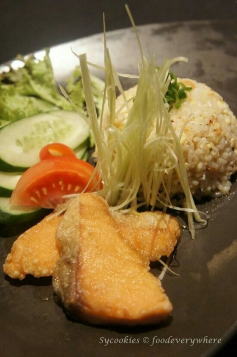 Salmon served with fried rice