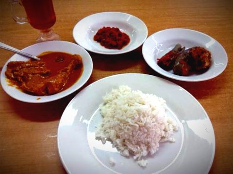 Padang style dinner- gulai ayam, pekerdel, brinjal and tea padang..