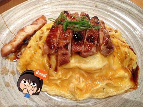 Jap version of omelette w fried rice - topped w chicken teriyaki