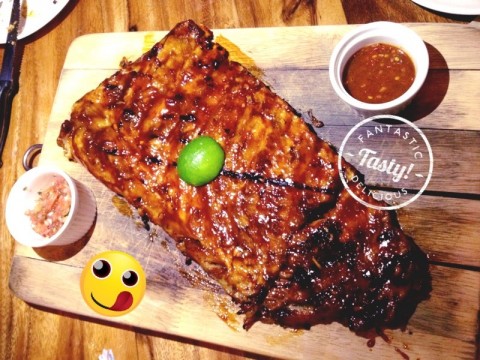 tender & smoky taste - bbq sauce complements the grilled pork ribs