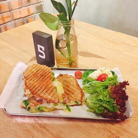 Crisp of panini with a delightful salad to go with.